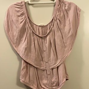 off the shoulder light pink shirt